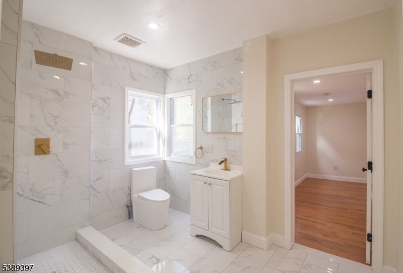 Bathroom, Glass Shower, Interior, Marble, Marble Walls, Recessed Lighting, Wood Texture Flooring