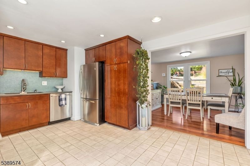 Dining room, Interior, Kitchen, Recessed Lighting, Stainless Steel Appliances, Wood Texture Flooring