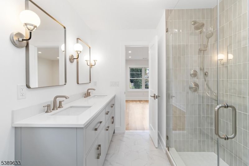 Bathroom, Dual Sink Vanities, Glass Shower, Interior, Marble, Recessed Lighting