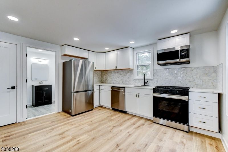 Interior, Kitchen, Recessed Lighting, Stainless Steel Appliances, Wood Texture Flooring