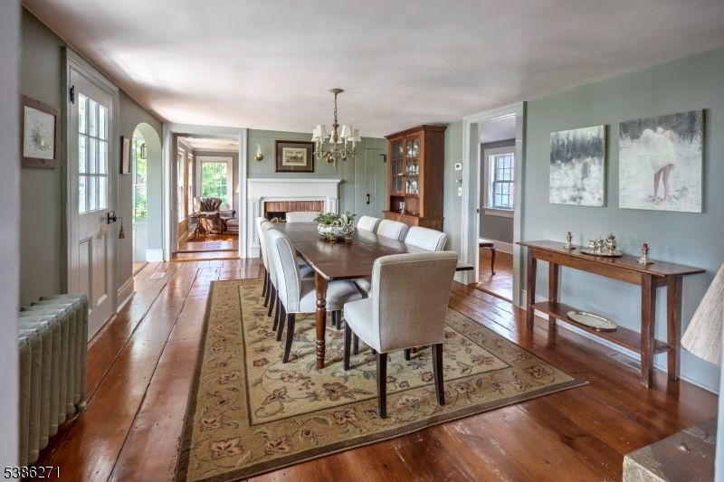 Chandelier, Dining room, Fireplace, Interior, Wood Texture Flooring