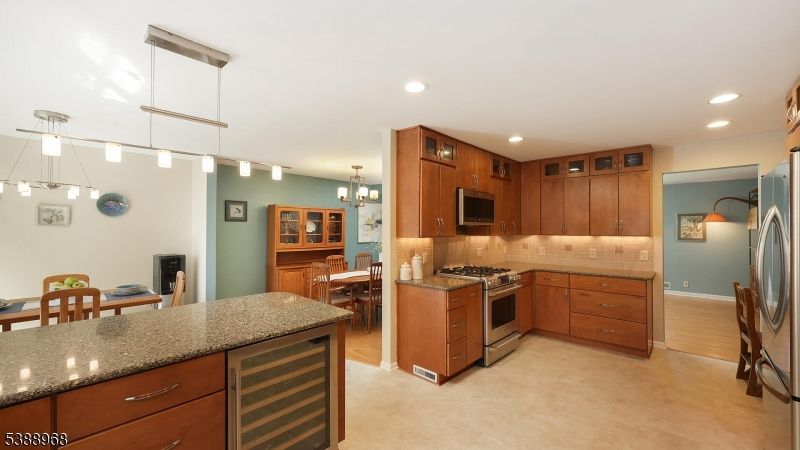 Chandelier, Dining room, Interior, Kitchen, Pendant Lights, Recessed Lighting, Stainless Steel Appliances