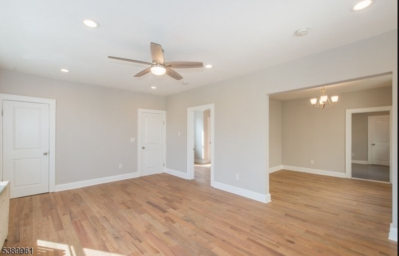 Chandelier, Empty room, Interior, Recessed Lighting, Wood Texture Flooring
