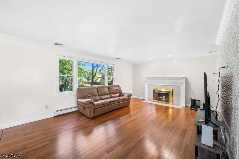 Fireplace, Interior, Recessed Lighting, Wood Texture Flooring