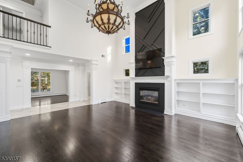 Chandelier, Fireplace, Interior, Recessed Lighting, Wood Texture Flooring
