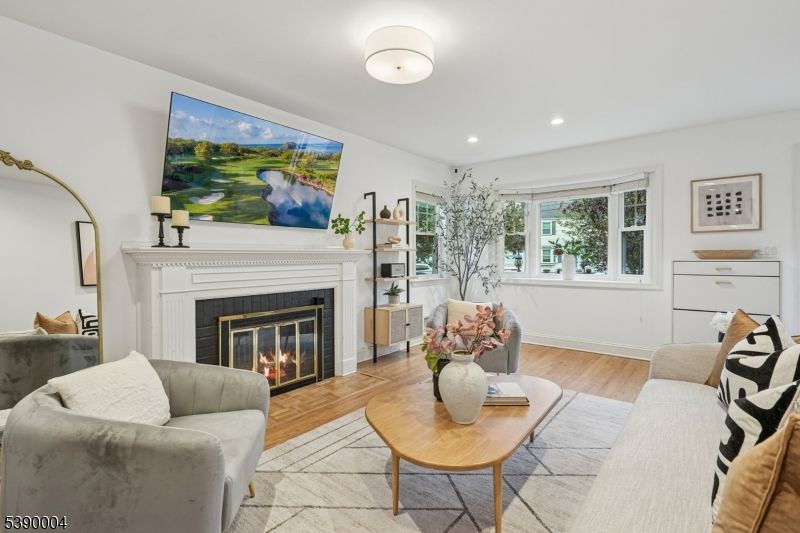 Fireplace, Interior, Living room, Recessed Lighting, Wood Texture Flooring