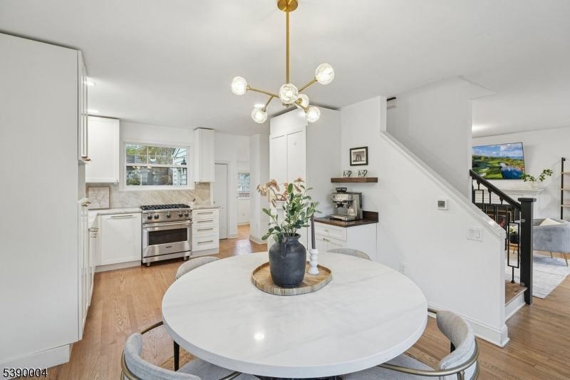 Dining room, Interior, Kitchen, Pendant Lights, Stainless Steel Appliances, Wood Texture Flooring