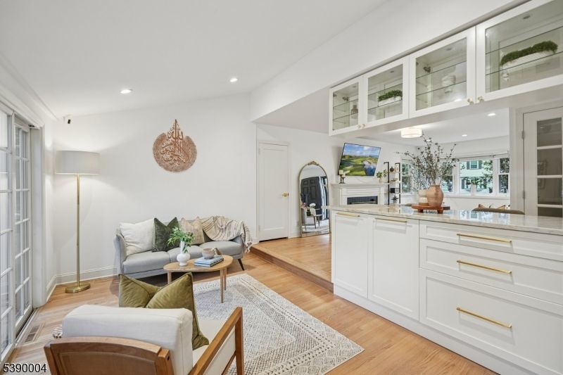 Fireplace, Interior, Living room, Recessed Lighting, Wood Texture Flooring