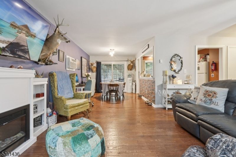 Dining room, Fireplace, Interior, Living room, Wood Texture Flooring