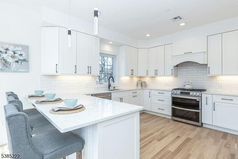 Interior, Kitchen, Pendant Lights, Recessed Lighting, Stainless Steel Appliances, Wood Texture Flooring