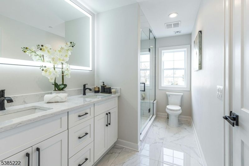 Bathroom, Dual Sink Vanities, Glass Shower, Interior, Marble, Recessed Lighting