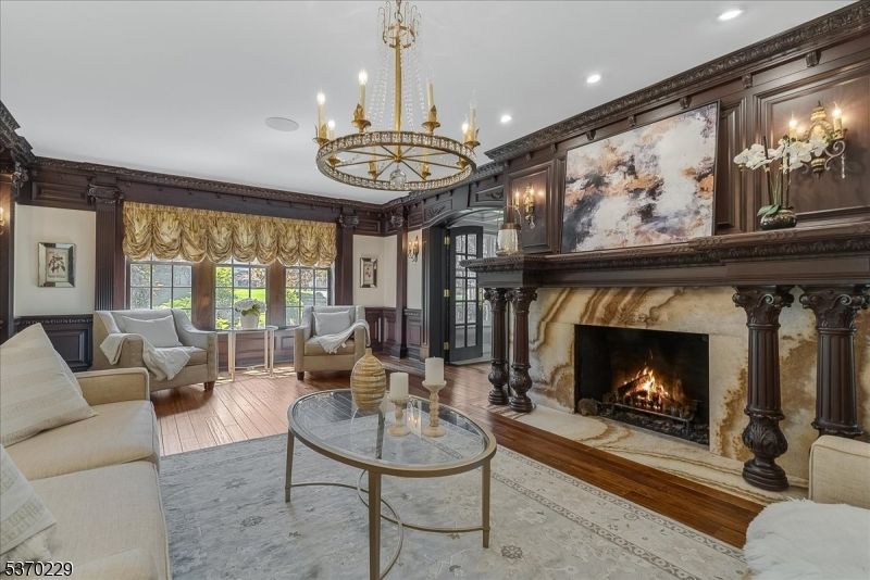 Chandelier, Fireplace, Interior, Living room, Recessed Lighting, Wood Texture Flooring