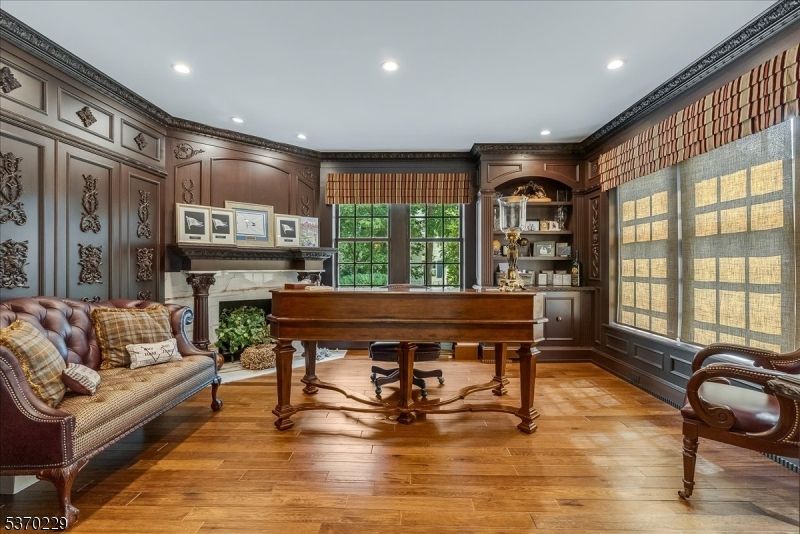 Fireplace, Home Office, Interior, Recessed Lighting, Wood Texture Flooring, Wooden Walls