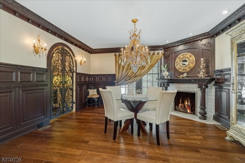 Chandelier, Dining room, Fireplace, Interior, Recessed Lighting, Wood Texture Flooring