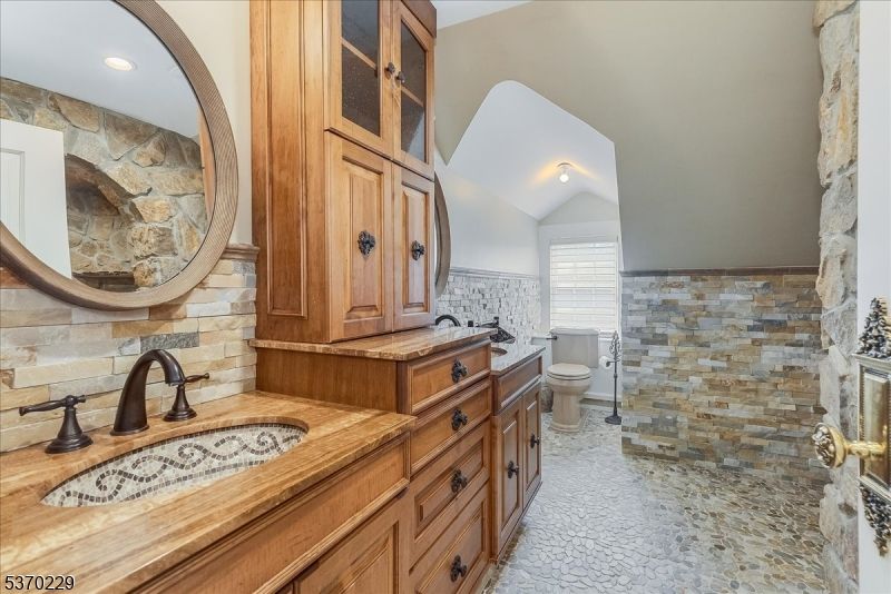 Bathroom, Dual Sink Vanities, Interior, Recessed Lighting, Stone Walls