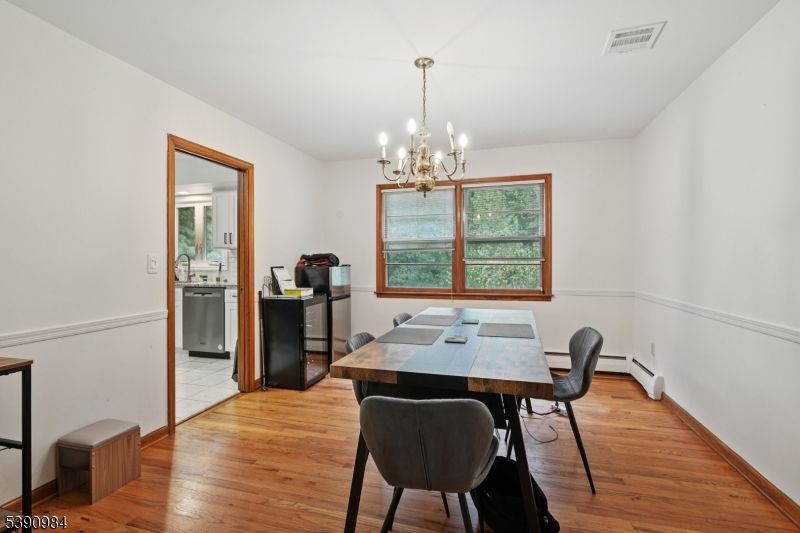 Chandelier, Dining room, Interior, Wood Texture Flooring
