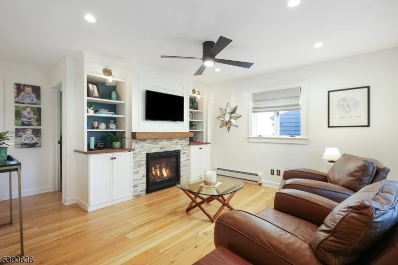 Fireplace, Interior, Living room, Recessed Lighting, Wood Texture Flooring