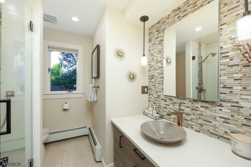 Bathroom, Glass Shower, Interior, Pendant Lights, Recessed Lighting, Wood Texture Flooring
