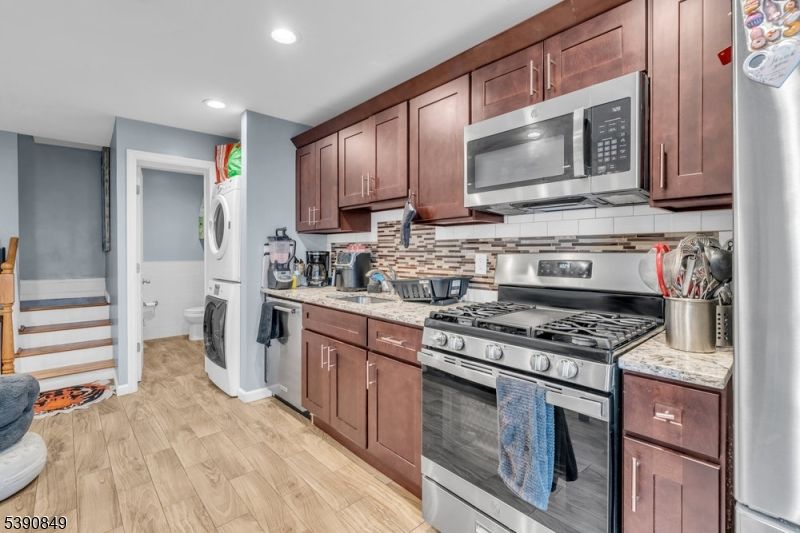 Interior, Kitchen, Recessed Lighting, Stainless Steel Appliances, Washer, Wood Texture Flooring