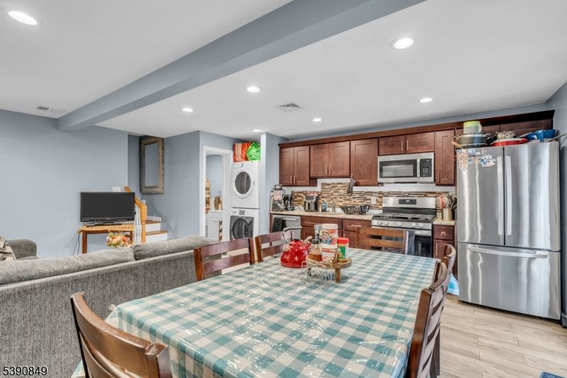 Dining room, Interior, Kitchen, Recessed Lighting, Stainless Steel Appliances, Wood Texture Flooring