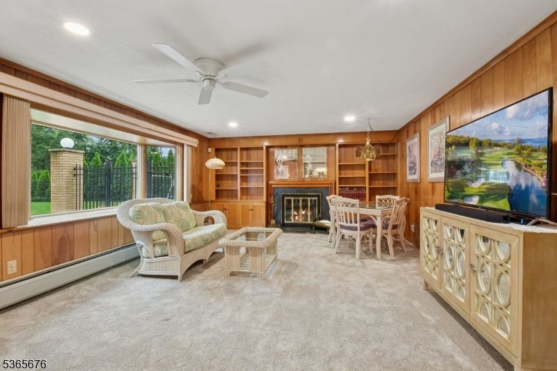 Dining room, Fireplace, Interior, Living room, Pendant Lights, Recessed Lighting, Wooden Walls