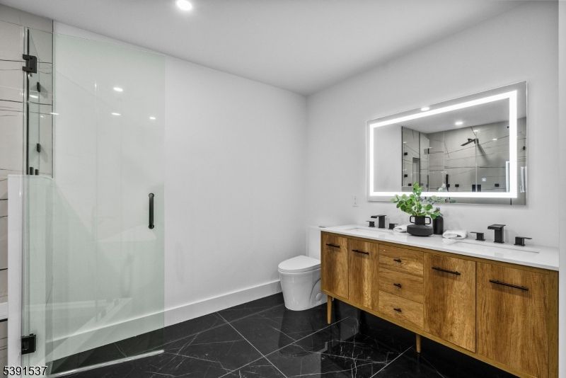 Bathroom, Dual Sink Vanities, Glass Shower, Interior, Marble, Recessed Lighting