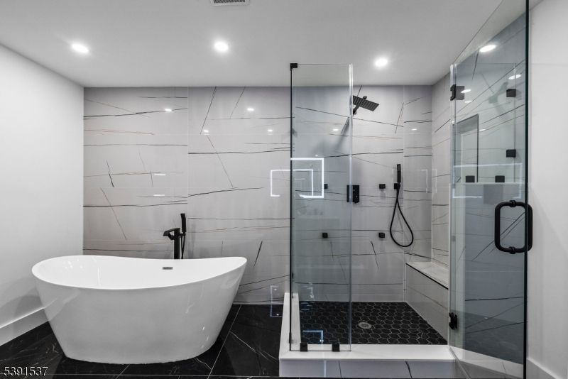 Bathroom, Free Standing Baths, Glass Shower, Interior, Marble Walls, Recessed Lighting