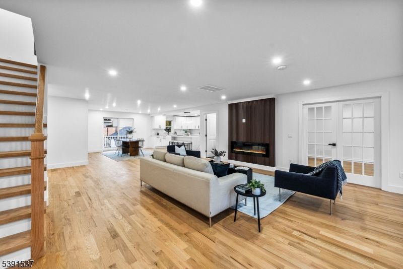 Fireplace, Interior, Kitchen, Living room, Recessed Lighting, Wood Texture Flooring