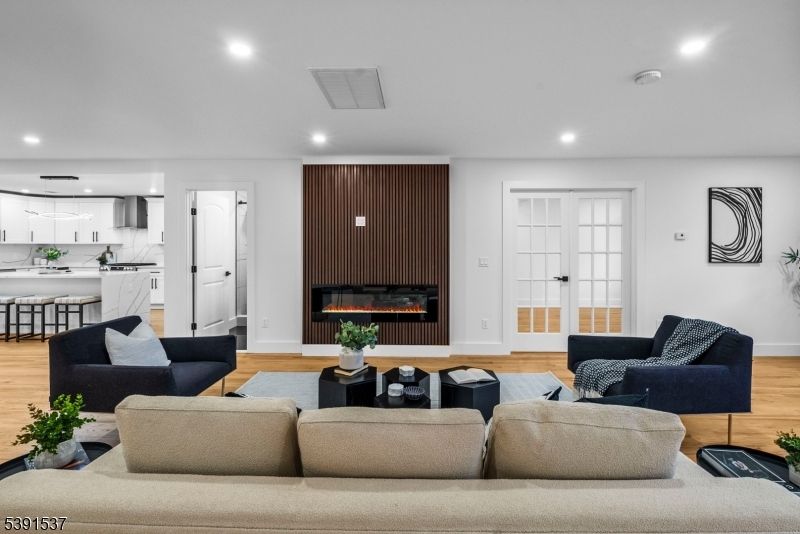 Fireplace, Interior, Kitchen, Living room, Recessed Lighting, Wood Texture Flooring