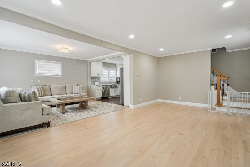 Interior, Living room, Recessed Lighting, Stainless Steel Appliances, Wood Texture Flooring