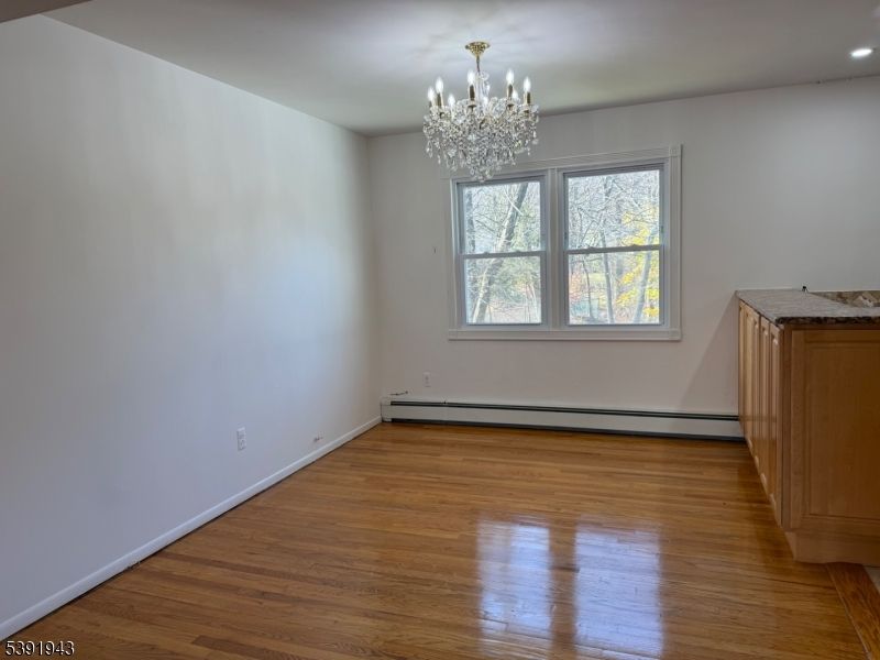 Chandelier, Empty room, Interior, Recessed Lighting, Wood Texture Flooring