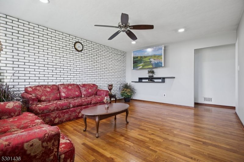 Interior, Living room, Recessed Lighting, Stone Walls, Wood Texture Flooring