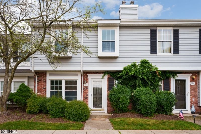 Exterior, Facade, Brick Facade, Raised Ranch