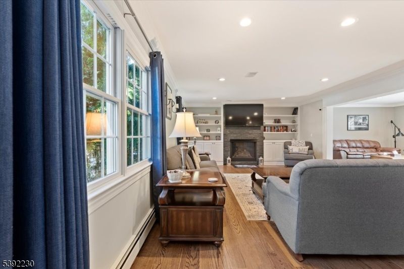 Fireplace, Interior, Living room, Recessed Lighting, Wood Texture Flooring