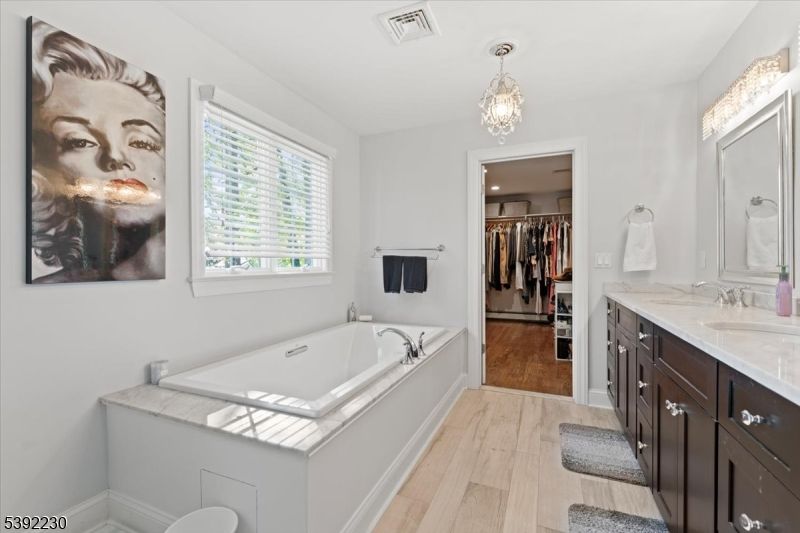 Bathroom, Chandelier, Dual Sink Vanities, Interior, Walk-in Closets, Wood Texture Flooring