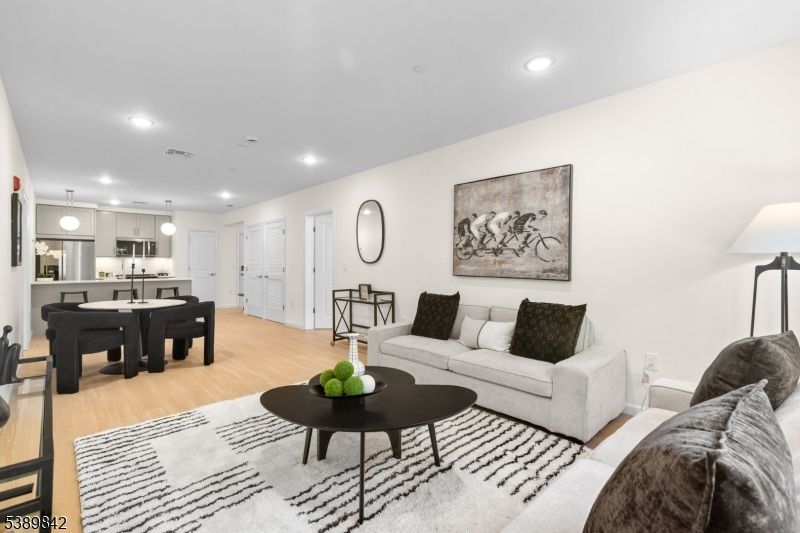 Dining room, Interior, Kitchen, Living room, Pendant Lights, Recessed Lighting, Stainless Steel Appliances, Wood Texture Flooring