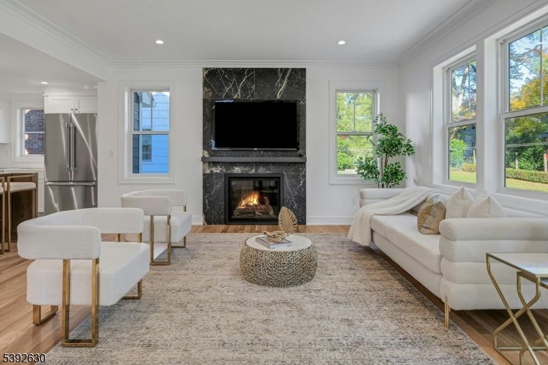 Fireplace, Interior, Kitchen, Living room, Recessed Lighting, Wood Texture Flooring