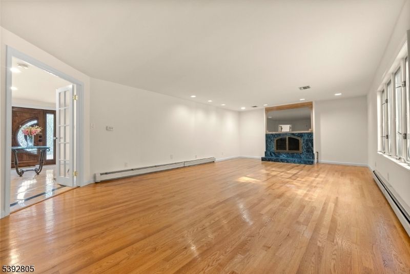 Empty room, Fireplace, Interior, Recessed Lighting, Wood Texture Flooring