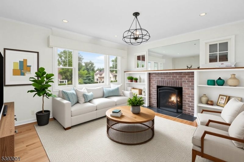 Chandelier, Fireplace, Interior, Living room, Recessed Lighting, Wood Texture Flooring