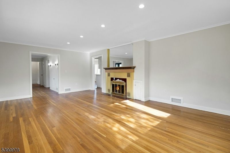 Empty room, Fireplace, Interior, Recessed Lighting, Wood Texture Flooring