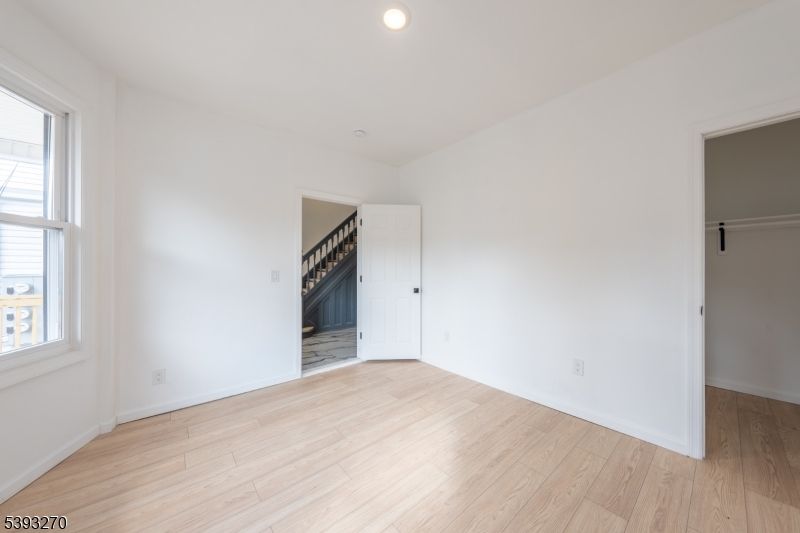 Empty room, Fireplace, Interior, Recessed Lighting, Wood Texture Flooring