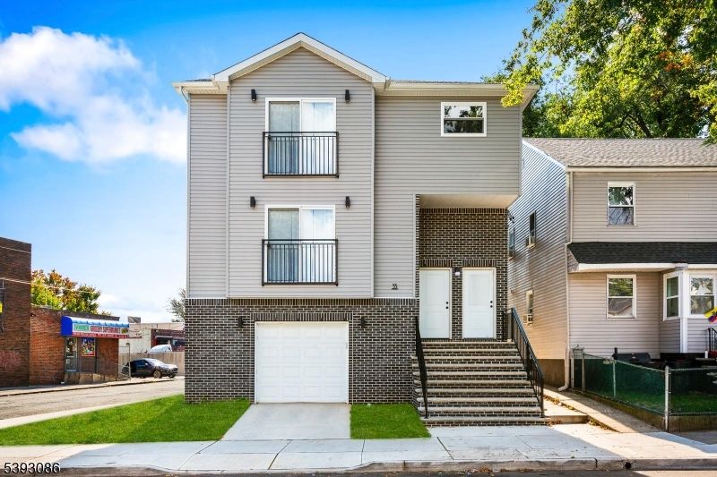 Attached, Exterior, Facade, Brick Facade, Rowhouse