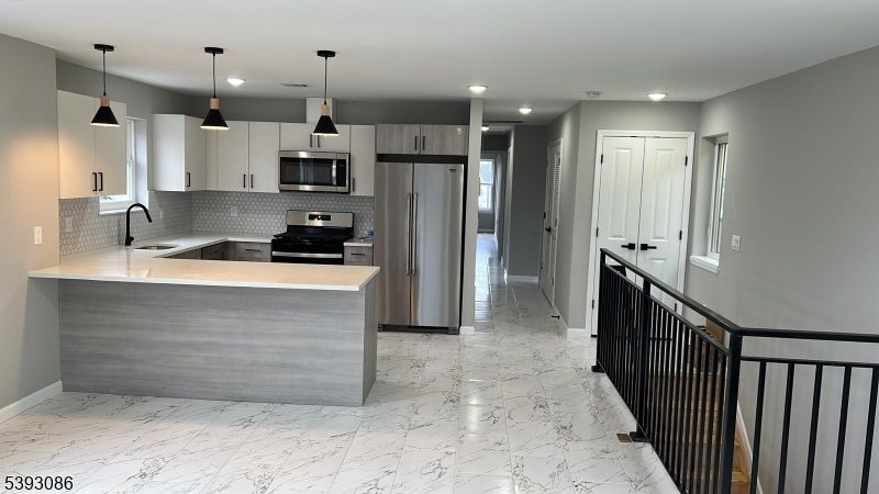 Interior, Kitchen, Marble, Pendant Lights, Recessed Lighting, Stainless Steel Appliances