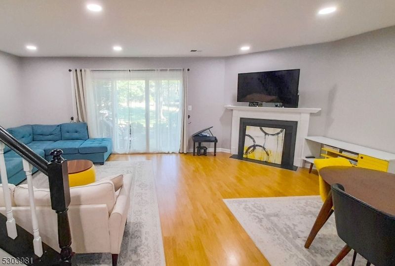 Fireplace, Interior, Living room, Recessed Lighting, Wood Texture Flooring