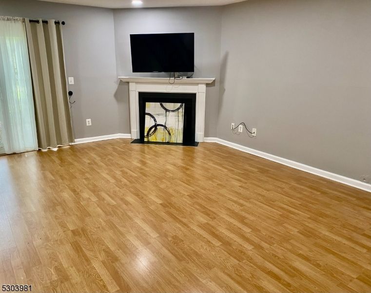 Empty room, Fireplace, Interior, Recessed Lighting, Wood Texture Flooring