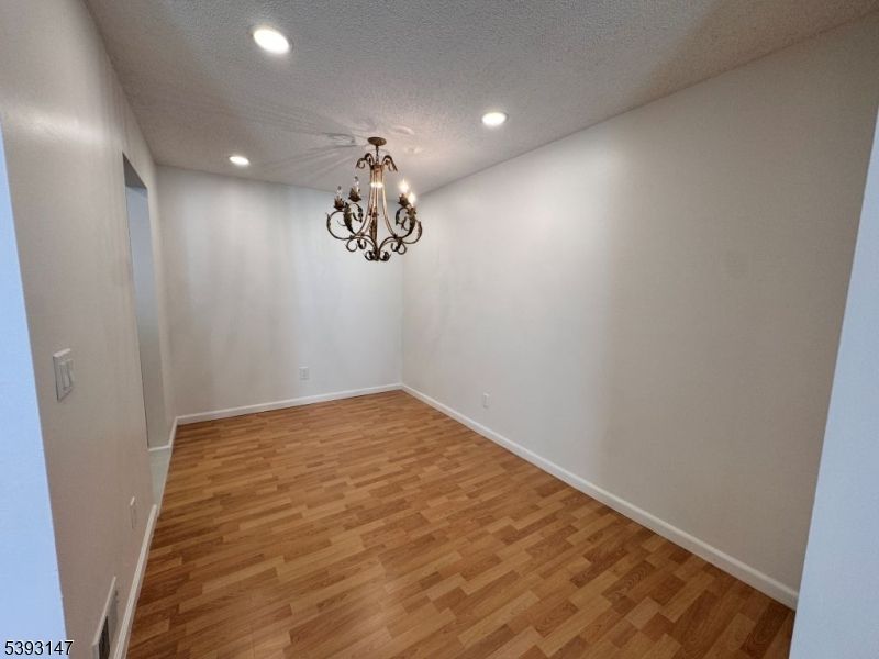 Chandelier, Empty room, Interior, Recessed Lighting, Wood Texture Flooring