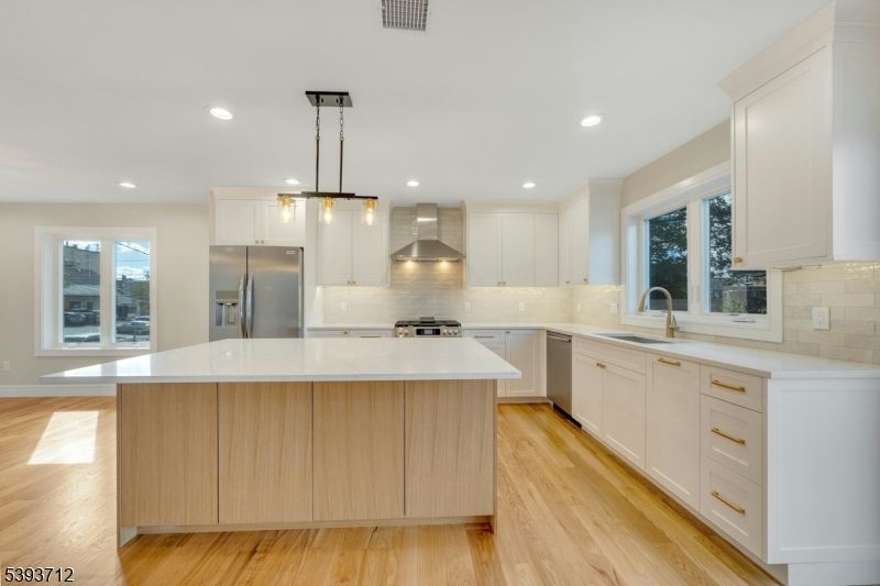 Interior, Kitchen, Pendant Lights, Recessed Lighting, Stainless Steel Appliances, Wood Texture Flooring