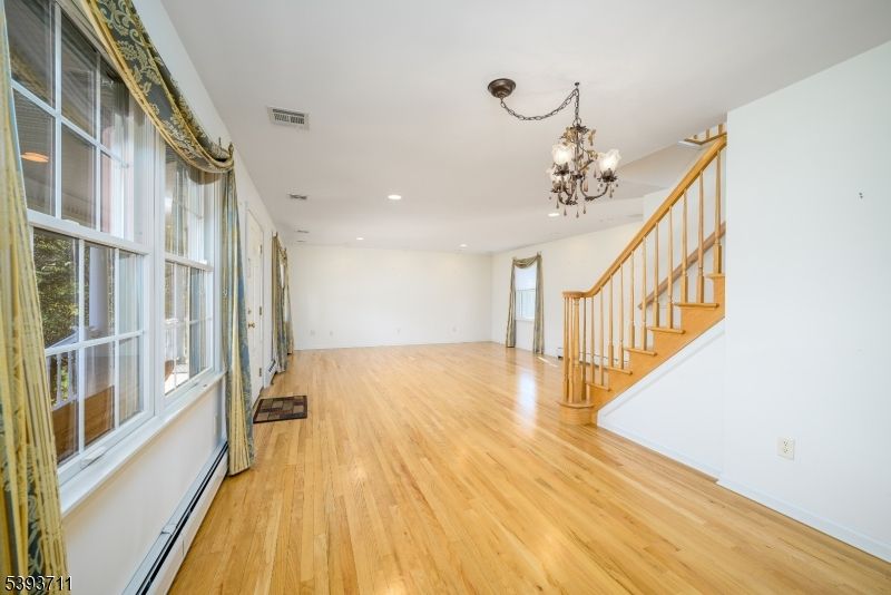 Chandelier, Empty room, Interior, Recessed Lighting, Wood Texture Flooring