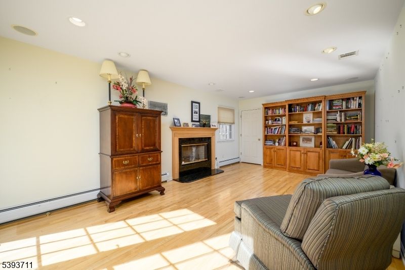 Fireplace, Interior, Recessed Lighting, Wood Texture Flooring