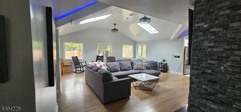 Interior, Living room, Recessed Lighting, Stone Walls, Wood Texture Flooring